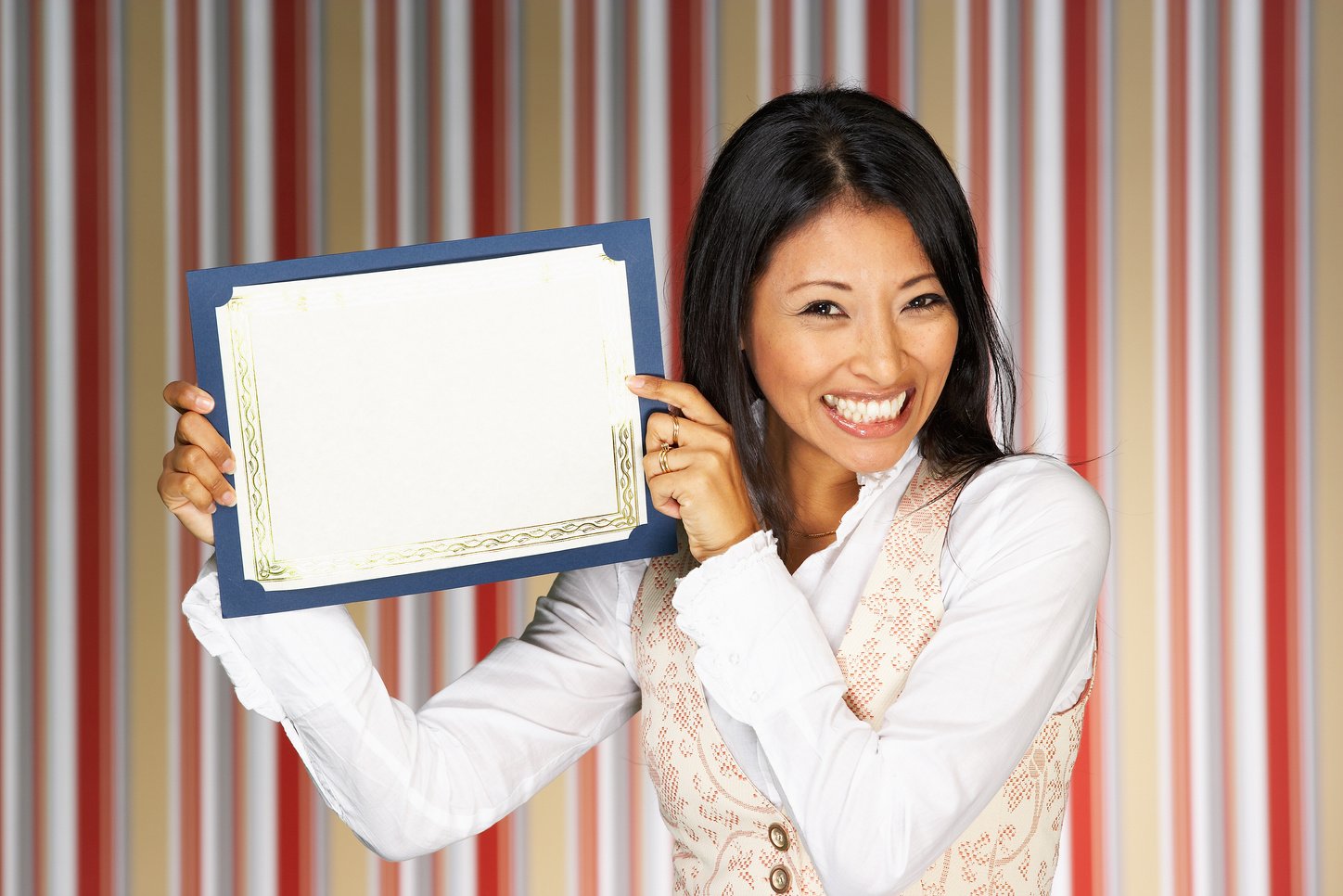 Woman displaying blank certificate